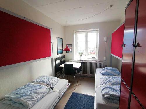 Femmasteren Hotel & Hostel Room Type - Quadruple Room with Shared Bathroom