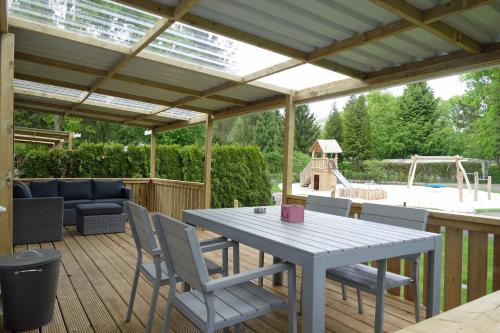 Kert, VerandaChalet 6p centrally located in National Park, Swimming pool 164 in Wateren