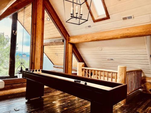 5500 sf cabin 6 king 2 queen beds heated pool spa game room mountain views