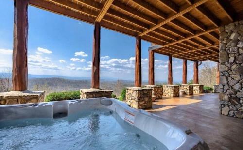 5500 sf cabin 6 king 2 queen beds heated pool spa game room mountain views