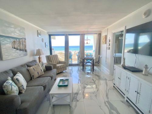 Island Winds East 202 by ALBVR - Beautifully renovated beachfront condo & steps away from Hangout & more!