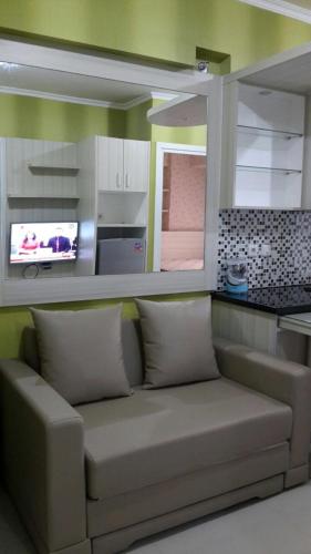 Apartement green pramuka city by Femi