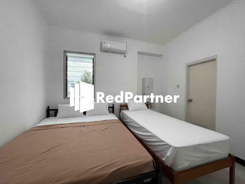 Family Room room in Hotel Pusponjolo Syariah Semarang Mitra RedDoorz