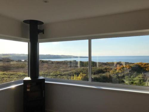 Coastal bungalow, sleeps 5 and ideal for walkers in 阿姆盧赫