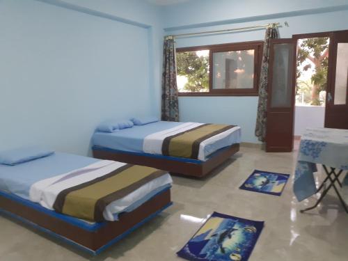Nile Roof Hotel& Restaurant Room Type - Deluxe Double Room with Sea View
