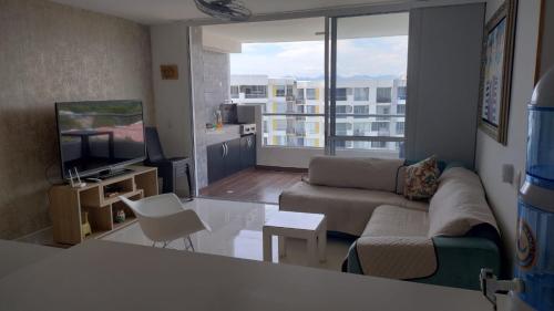 Acogedor Apartamento en Ricaurte con BBQ in Ricaurte