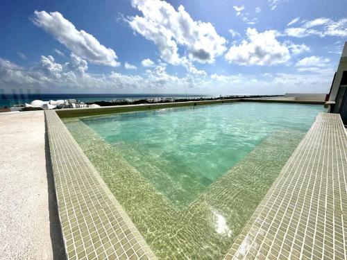 Ocean View Luxury Loft with Rooftop Pool & Sky Bar in Playa del Carmen, Mexico