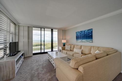 Coastal Condo with Pool Access Steps to Beach! - image 12
