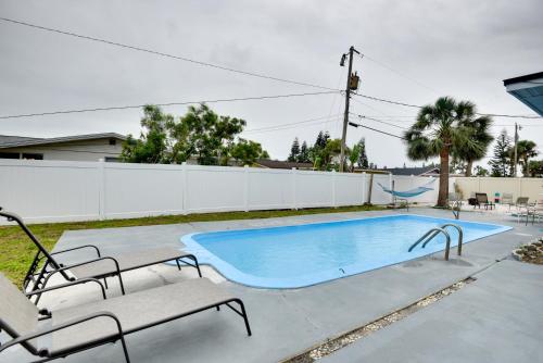 Modernized Coastal Oasis with Pool and Game Room! - main image