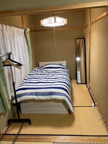 Triple Room with Shared Bathroom