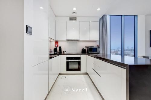 Stylish waterfront 1 BR at district one - image 5