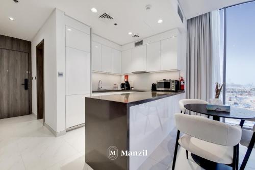 Stylish waterfront 1 BR at district one - main image