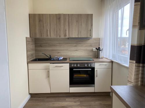 kuchyně, Apartmenthaus am Watt Busum in Busum