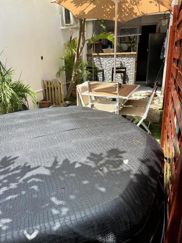 Appartement cosy pres de Ducos avec jacuzzi prive 27 m²