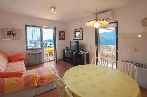 One-Bedroom Apartment with Balcony and Sea View