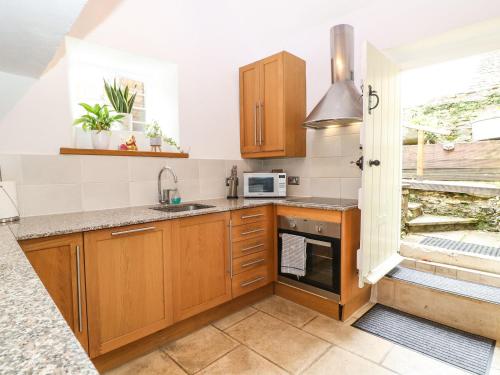 Buitenkant, Castle Combe Cottage in Castle Combe