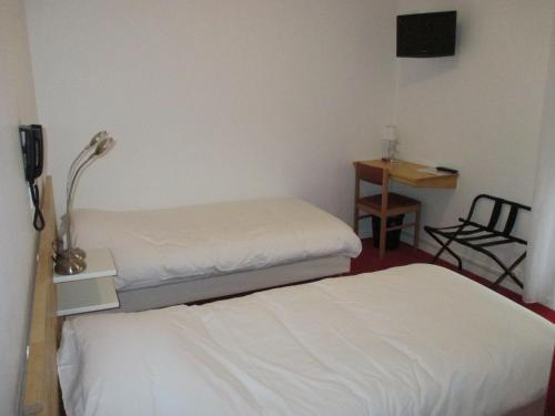 Chambre avec 2 lits