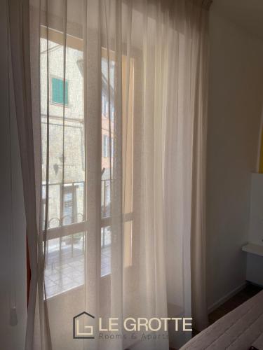 Affittacamere Le Grotte - Le Grotte Rooms & Apartments