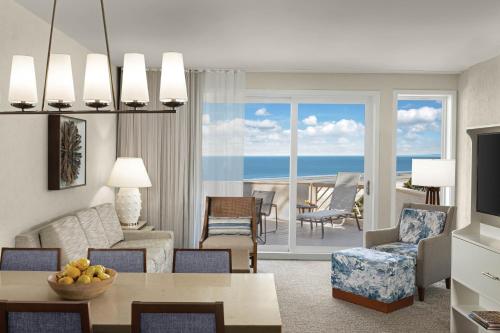 Two-Bedroom Oceanfront Villa with One King Bed, Two Twin Beds, Sofa Bed and Balcony
