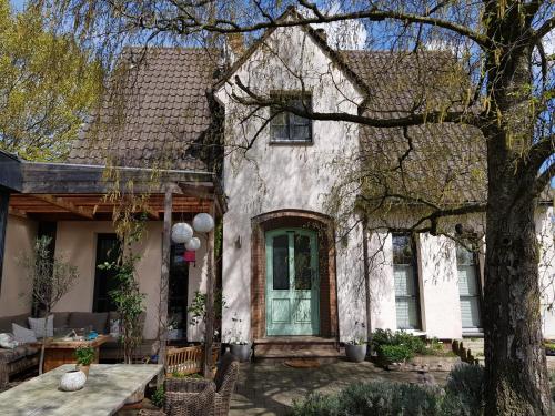 Сад, Ferienwohnung Niederrhein in Везель