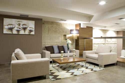 ห้องส่วนกลางสำหรับนั่งเล่น/ดูทีวี, Hotel Arsus in วิโก้