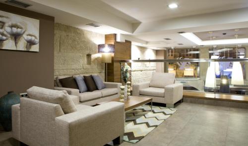 ห้องส่วนกลางสำหรับนั่งเล่น/ดูทีวี, Hotel Arsus in วิโก้