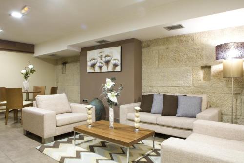 ห้องส่วนกลางสำหรับนั่งเล่น/ดูทีวี, Hotel Arsus in วิโก้