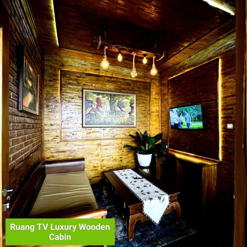 Shared lounge/TV area, Bagas Luxury Camp in Serang