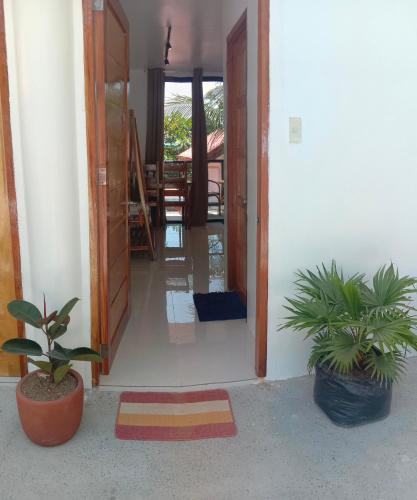 Corong Beach Resort Room Type - Deluxe Double Room with Side Sea View