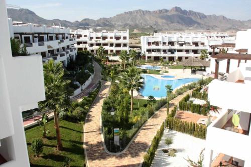  Andalucia apartamento con terraza jardín y piscina comunitaria in San Juan de los Terreros