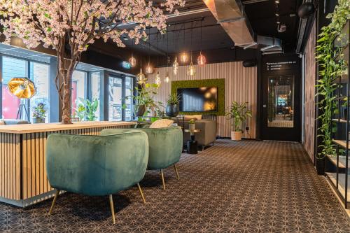 Közös társalgó / TV, Hotel de Duif Lisse - Keukenhof in Lisse