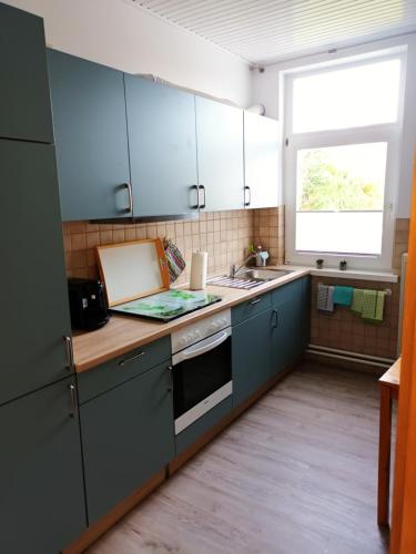 Kitchen, Ferienwohnung am Dorfteich in Fehmarn