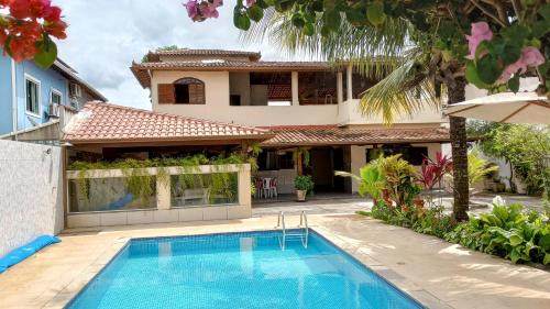 Casa Linear Térrea com Piscina no Atlântico