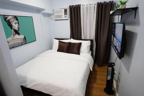 Las Piñas Cozy Condo with netflix