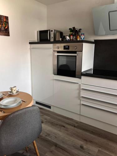 virtuve, Eifelhaus LandLuft mit Infrarotkabine in Berlingen