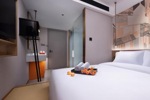Urban Exquisite King Room room in From K Huan Kai Hotel -Changsha Wuyi Plaza IFS Branch