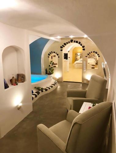 共用Lounge/電視區, Traditional Cave Villa-Paradise & Prive Jacuzzi in 安普雷奧