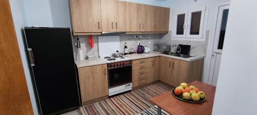 Kitchen, Charlami's Mansion -Παραδοσιακο Πετρινο Σπιτι με Τζακι και Πανοραμικη Θεα in Paramythia