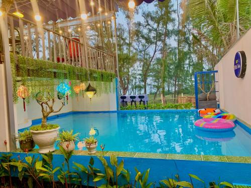 Charming and Spacious Beach Homestay 4 Rooms 1 Pool Entire Palace in Dien Duong