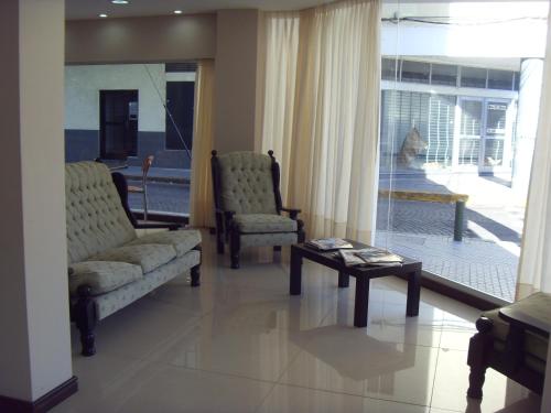 Shared lounge/TV area, Hotel Micro in Rosario