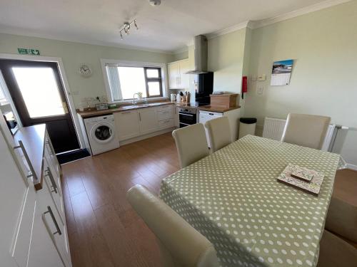 Self Catering house with lovely sea views, 44 Back photo 2
