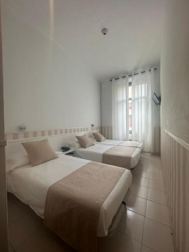 Camera tripla, 3 letti