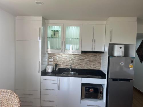 Accommodation near Mae Ramphueng Beach Sea San Sun Condominium