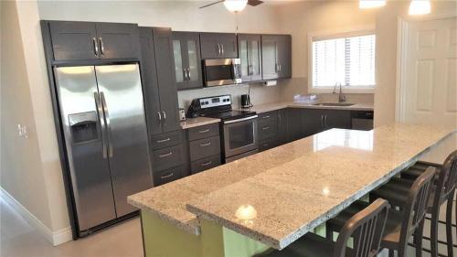 Private 4BR-5 Bath Luxury Villa with Pool in Gated Community near beaches in Bon Accord Village