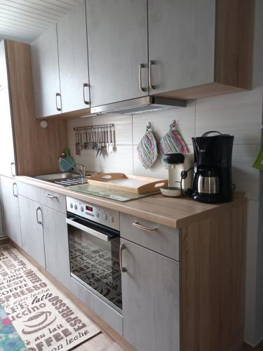 Kitchen, Ferienwohnung am Dorfteich in Fehmarn