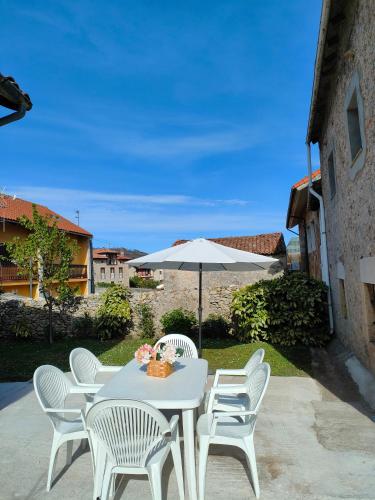 Casa rústica con jardín en Pesués