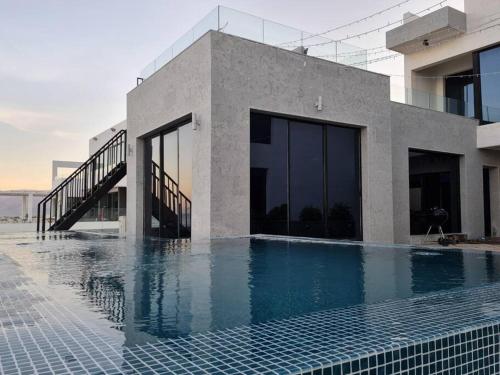 Swimming pool, Wadi Shab/Fins Villa in Tiwi