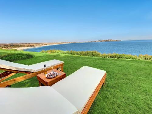 Tuvākā izklaides vieta, *1era Línea 1er Piso* Jardín, Playa, Piscinas 6p (*1era Linea 1er Piso* Jardin, Playa, Piscinas 6p) in Tongoy