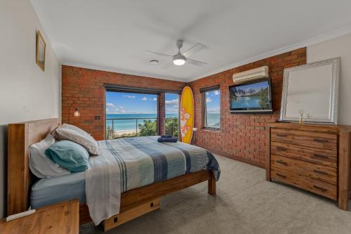 Beachfront-private beach access and 180 degree bay views!