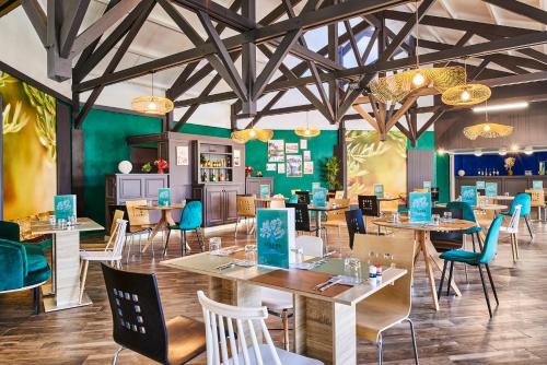 Ресторан, Ibis Budget Saint-Ouen-l'Aumône in Сан-Уан-ль'Омон